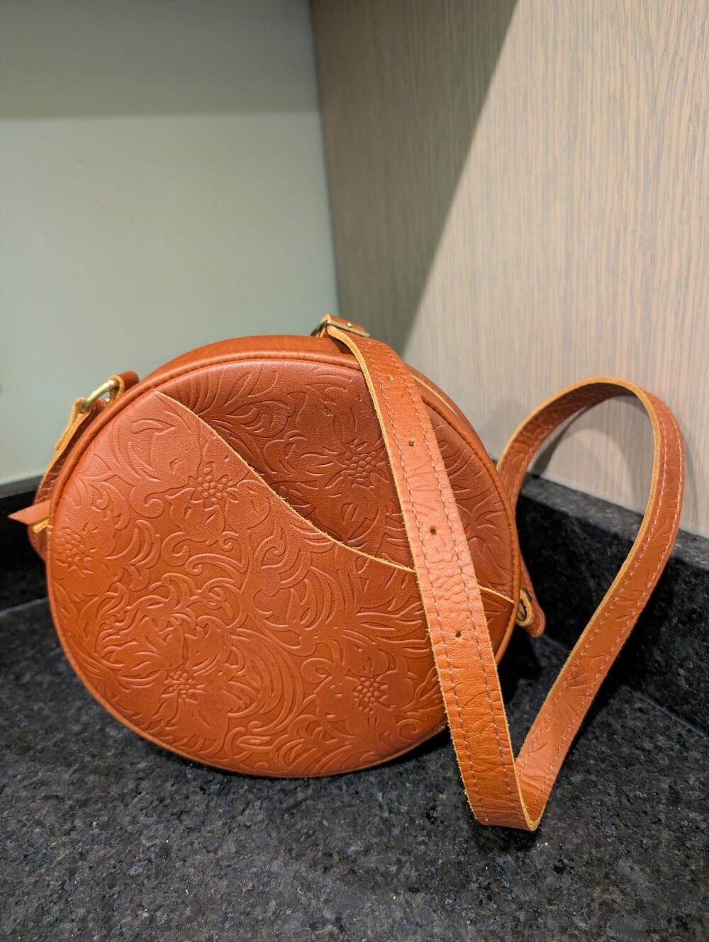 Portland Leather Tan Embossed Round Crossbody Bag